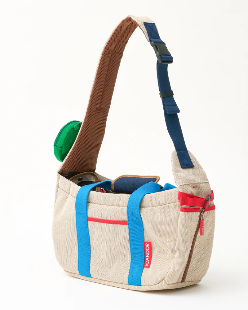 Peek-a-Boo Dog Sling Bag in Cream